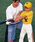 dad and son playing baseball